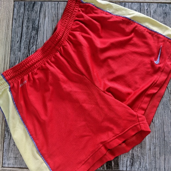 Nike dri fit red shorts yellow stripe, purple trim - Picture 1 of 4